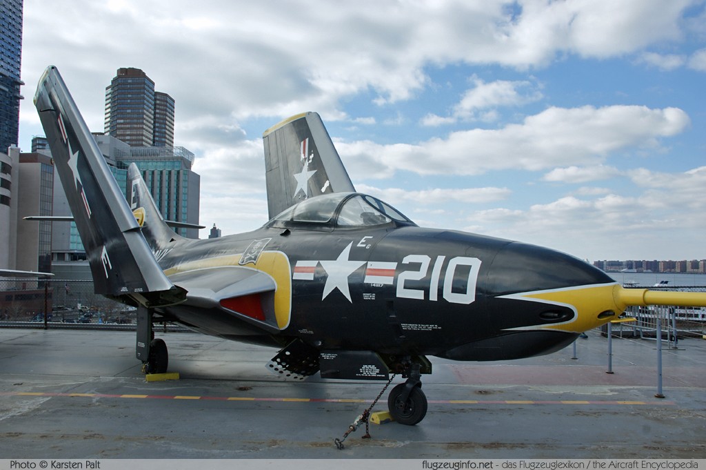 Grumman F-9J (F9F-8) Cougar United States Navy 141117 E-210 Intrepid Air, Space & Sea Museum New York City, NY 2014-03-09 � Karsten Palt, ID 7900 Grumman F-9J (F9F-8) Cougar United States Navy 141117 E-210 Intrepid Air, Space & Sea Museum New York City, NY 2014-03-09 � Karsten Palt, ID 7900